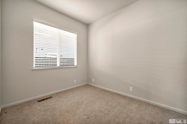 10055 Zephyr Heights Dr, Reno, NV 89521 - carpeted empty room with baseboards