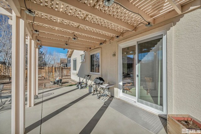 10055 Zephyr Heights Dr, Reno, NV 89521 - view of patio / terrace featuring a pergola