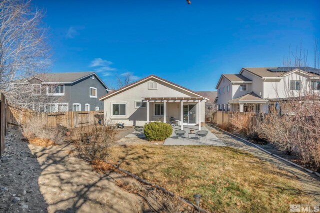 10055 Zephyr Heights Dr, Reno, NV 89521 - rear view of house featuring a pergola, a patio, and stucco siding