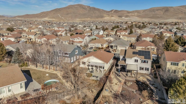 10055 Zephyr Heights Dr, Reno, NV 89521 - aerial view of property's location with nearby suburban area and a mountainous background