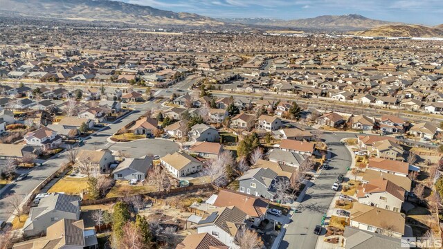 10055 Zephyr Heights Dr, Reno, NV 89521 - aerial view of property's location featuring nearby suburban area and mountains