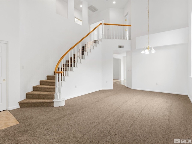 915 Lakeview Dr, Dayton, NV 89403 - staircase with a towering ceiling, carpet floors, baseboards, and recessed lighting