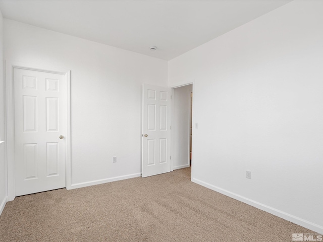 915 Lakeview Dr, Dayton, NV 89403 - unfurnished bedroom with carpet floors and baseboards
