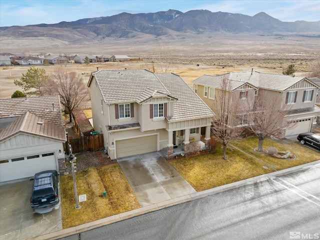 915 Lakeview Dr, Dayton, NV 89403 - view of front of home featuring a mountain view, a residential view, a tiled roof, stucco siding, and fence