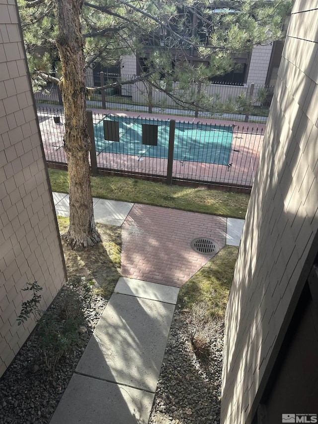 1465 E Peckham Ln Apt 40, Reno, NV 89502 - view of yard featuring fence and a patio area