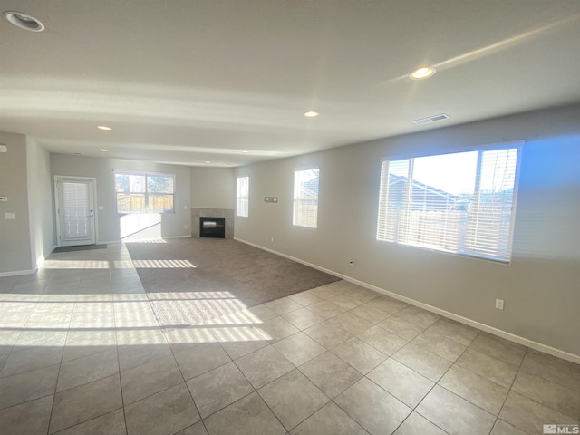 756 Iron Stirrup Ct, Sparks, NV 89436 - unfurnished living room with recessed lighting, baseboards, tile patterned flooring, and a fireplace