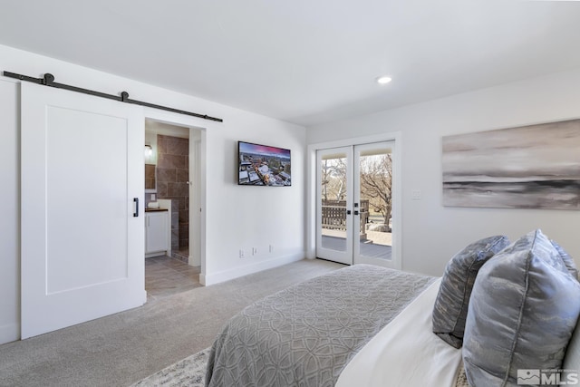 915 Maple Creek Ct, Reno, NV 89511 - carpeted bedroom with a barn door, access to outside, recessed lighting, ensuite bathroom, and baseboards