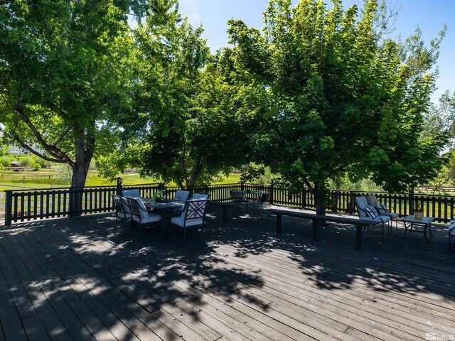 915 Maple Creek Ct, Reno, NV 89511 - wooden terrace with outdoor dining space