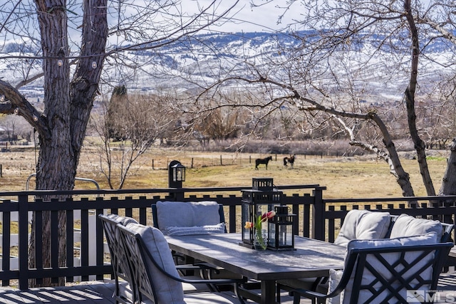 915 Maple Creek Ct, Reno, NV 89511 - wooden terrace with outdoor dining space and a mountain view