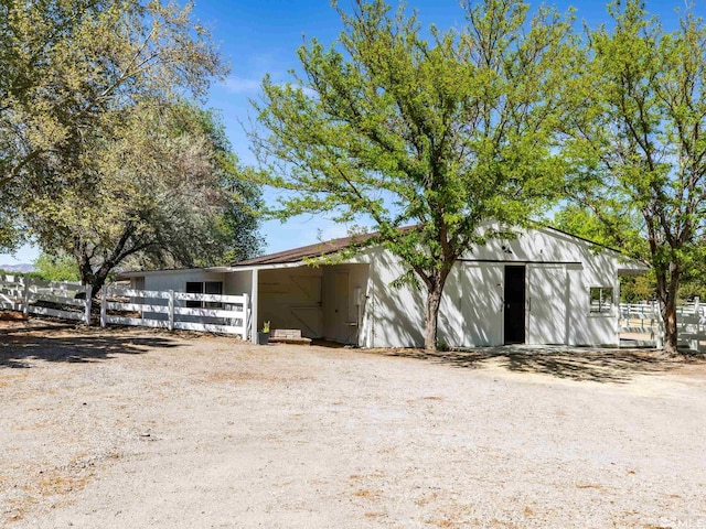 915 Maple Creek Ct, Reno, NV 89511 - view of pole building featuring fence and an exterior structure