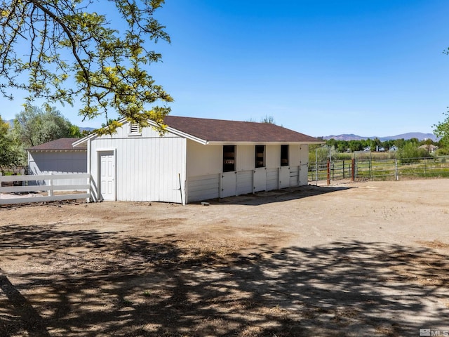 915 Maple Creek Ct, Reno, NV 89511 - horse barn featuring a mountain view