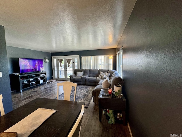 96 E Eisenhower Ave, Winnemucca, NV 89445 - living room featuring wood finished floors, french doors, and a textured ceiling