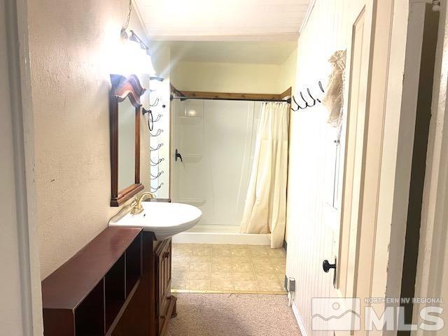 85 S Main, Paradise Valley, NV 89426 - bathroom with a shower stall and vanity