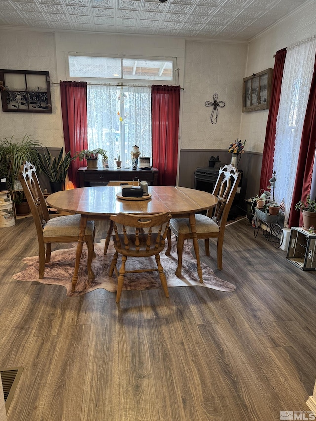 85 S Main, Paradise Valley, NV 89426 - dining room with an ornate ceiling, wood finished floors, and a wainscoted wall