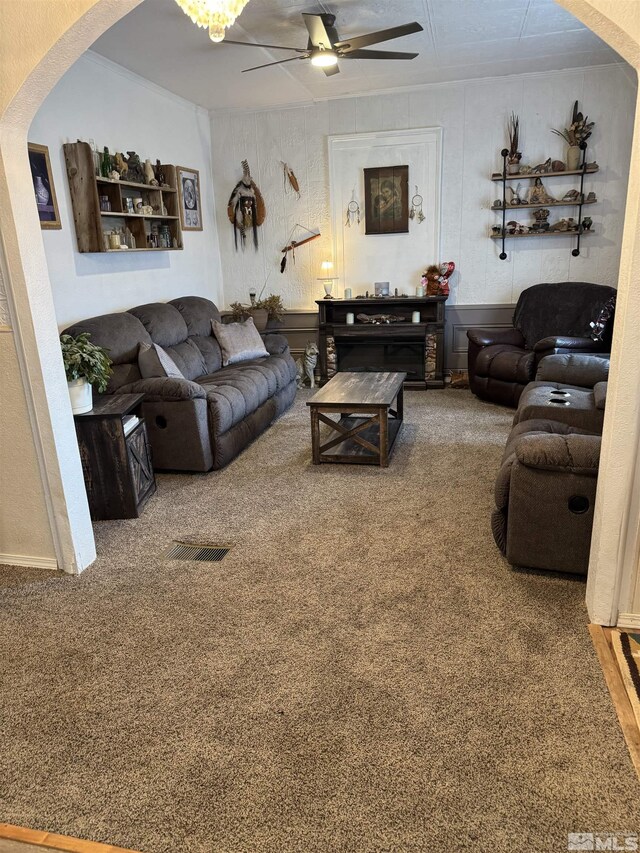 85 S Main, Paradise Valley, NV 89426 - carpeted living room with arched walkways and a ceiling fan