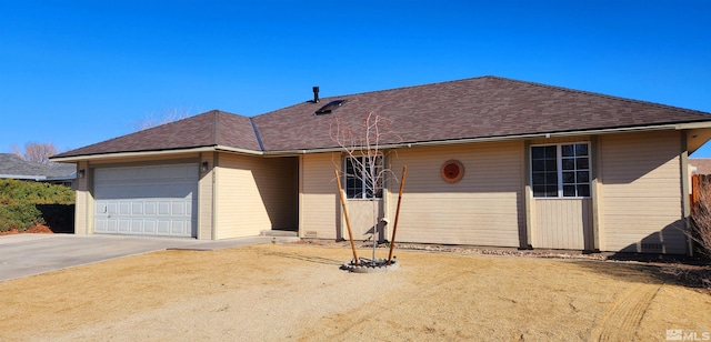 450 Pintail Dr, Fallon, NV 89406 - ranch-style home featuring a garage, concrete driveway, and a shingled roof