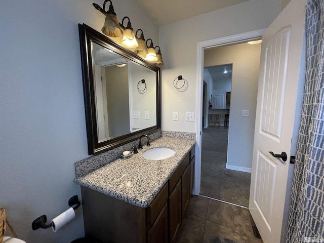 bathroom with vanity and tile patterned flooring