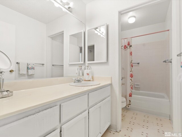 2845 Idlewild Dr # 210, Reno, NV 89509 - full bath with toilet, tile patterned floors, vanity, and shower / bath combo