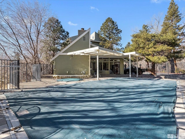 2845 Idlewild Dr # 210, Reno, NV 89509 - back of house featuring fence, a chimney, stucco siding, and a patio