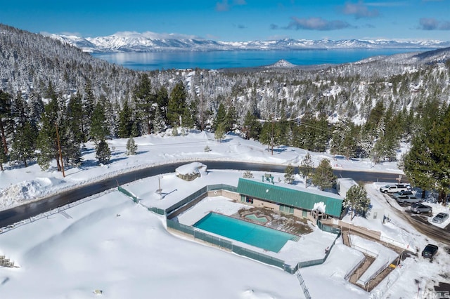331 Tramway Dr # 26, Stateline, NV 89449 - snowy aerial view featuring view of pool area and a water and mountain view