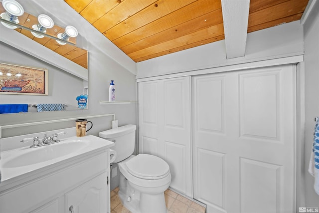 331 Tramway Dr # 26, Stateline, NV 89449 - bathroom featuring wooden ceiling, toilet, vanity, lofted ceiling, and tile patterned floors