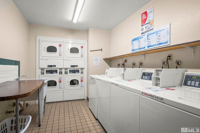 2450 Lymbery St Unit 206, Reno, NV 89509 - communal laundry room featuring estacked washer and dryer and washing machine and clothes dryer