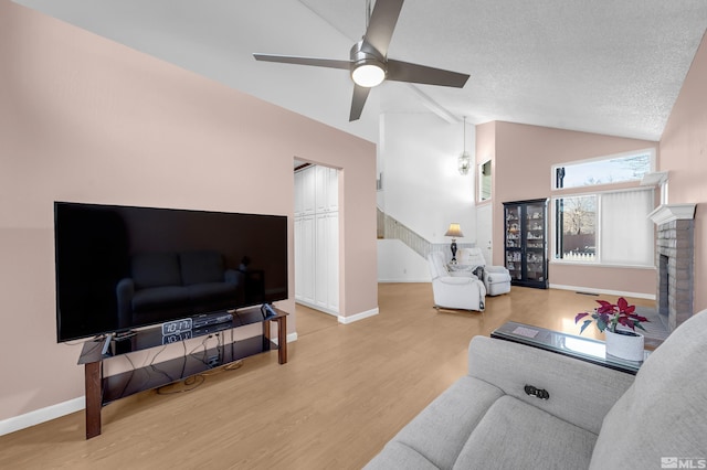 6357 Moon Ridge Ter, Reno, NV 89523 - living area featuring ceiling fan, baseboards, wood finished floors, stairway, and a textured ceiling
