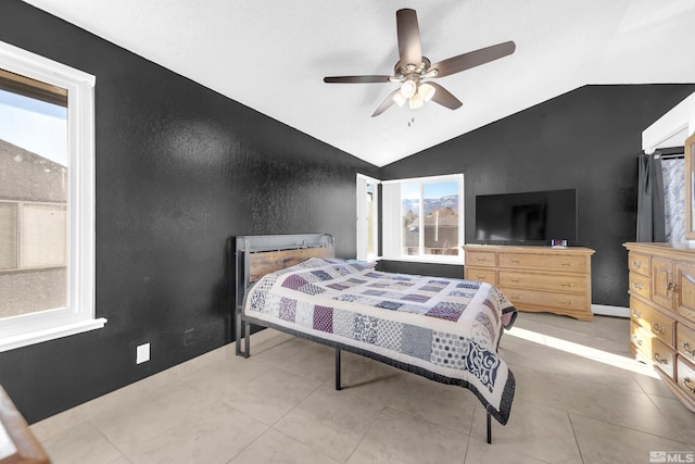 6357 Moon Ridge Ter, Reno, NV 89523 - bedroom featuring vaulted ceiling, ceiling fan, and tile patterned floors