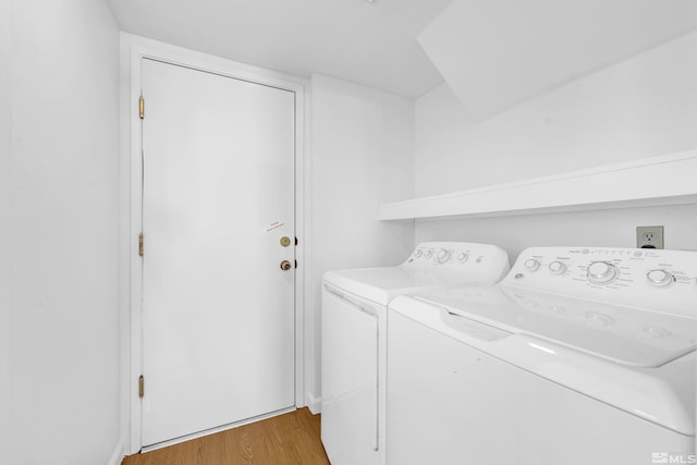 6357 Moon Ridge Ter, Reno, NV 89523 - laundry area with washer and clothes dryer and light wood-type flooring