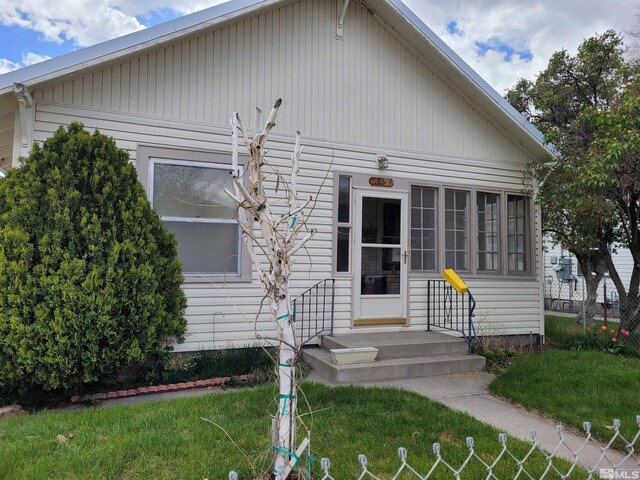 449 W 2nd St, Winnemucca, NV 89445 - view of front facade featuring a front yard