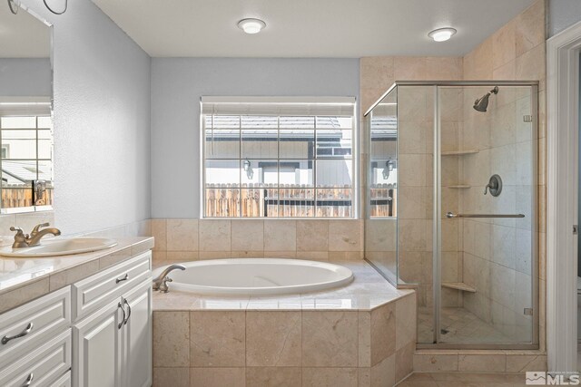 6540 Monticello Ct, Reno, NV 89519 - full bath with a stall shower, a garden tub, and vanity