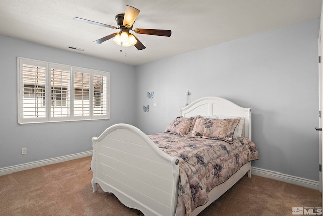 6540 Monticello Ct, Reno, NV 89519 - bedroom with carpet flooring, baseboards, and a ceiling fan