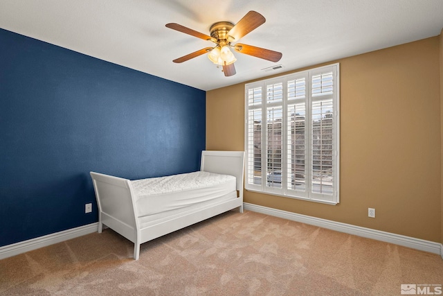 6540 Monticello Ct, Reno, NV 89519 - unfurnished bedroom featuring carpet, baseboards, and a ceiling fan