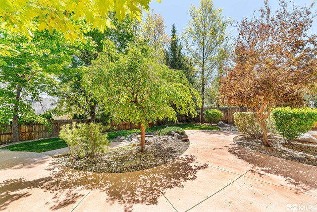 6540 Monticello Ct, Reno, NV 89519 - fenced backyard featuring a patio area