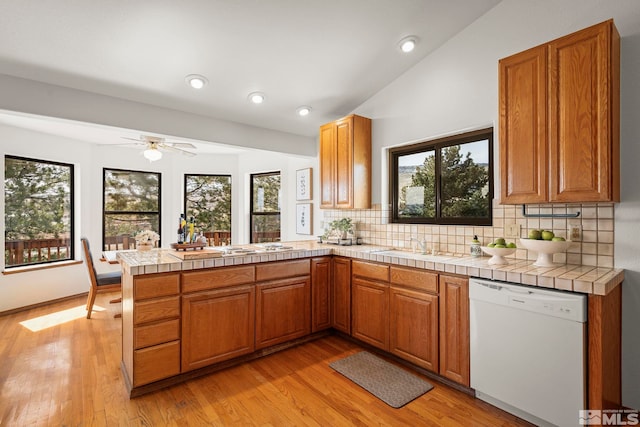 80 Cassas Ct, Reno, NV 89511 - kitchen featuring dishwasher, a peninsula, healthy amount of natural light, and recessed lighting