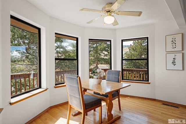 80 Cassas Ct, Reno, NV 89511 - dining area featuring baseboards, light wood finished floors, and a ceiling fan