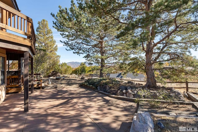 80 Cassas Ct, Reno, NV 89511 - view of home's community with a patio area and a mountain view