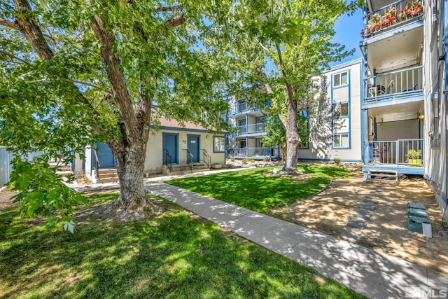 2555 Clear Acre Ln Unit 89/2, Reno, NV 89512 - view of home's community with a lawn and entry steps