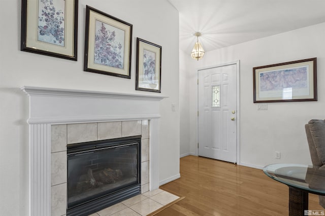 1018 Ringneck, Sparks, NV 89441 - foyer featuring wood finished floors, a fireplace, and baseboards