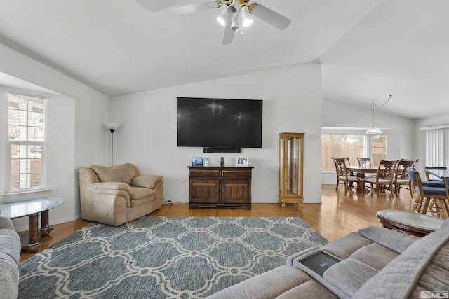 1018 Ringneck, Sparks, NV 89441 - living room with vaulted ceiling, ceiling fan, and wood finished floors