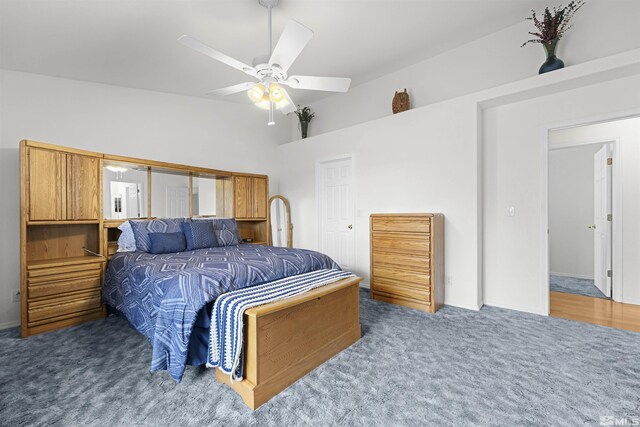 1018 Ringneck, Sparks, NV 89441 - carpeted bedroom with a ceiling fan, vaulted ceiling, and baseboards