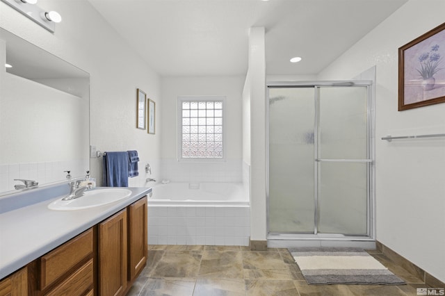 1018 Ringneck, Sparks, NV 89441 - full bathroom with a shower stall, a garden tub, and vanity