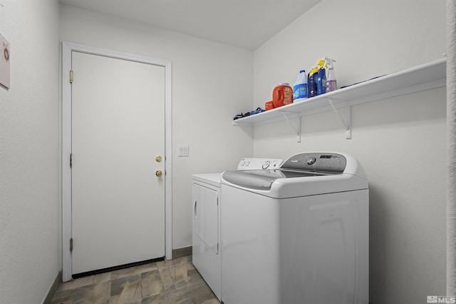 1018 Ringneck, Sparks, NV 89441 - laundry area featuring independent washer and dryer, stone finish flooring, and baseboards