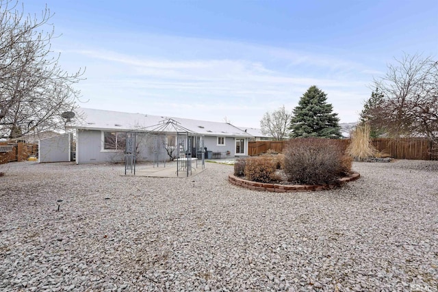 1018 Ringneck, Sparks, NV 89441 - rear view of house featuring a gazebo, a fenced backyard, and a patio area
