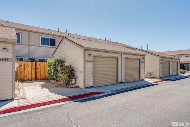 13846 Lear Blvd, Reno, NV 89506 - view of front of home featuring fence and a shingled roof