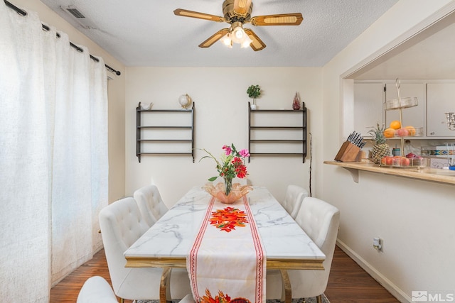 13846 Lear Blvd, Reno, NV 89506 - dining area featuring wood finished floors, ceiling fan, a textured ceiling, and baseboards
