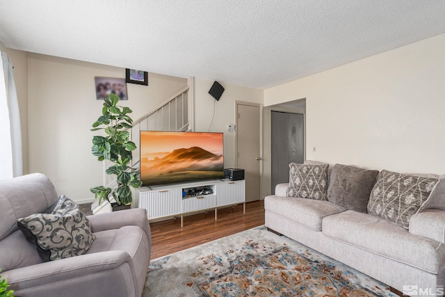 13846 Lear Blvd, Reno, NV 89506 - living room featuring wood finished floors, stairs, and baseboards