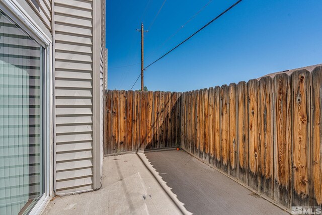 13846 Lear Blvd, Reno, NV 89506 - view of patio / terrace with fence
