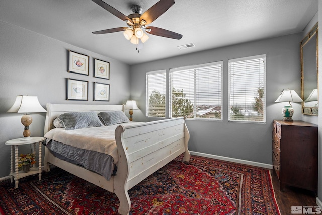 385 Mustengo Ct, Reno, NV 89506 - bedroom featuring baseboards, wood finished floors, and ceiling fan
