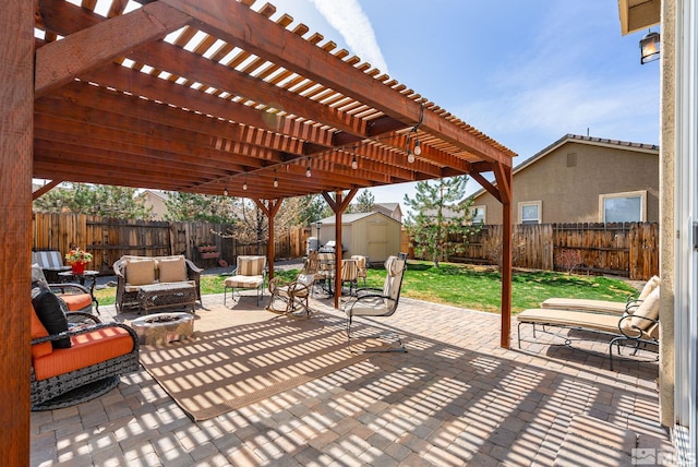 385 Mustengo Ct, Reno, NV 89506 - view of patio / terrace with a pergola and an outdoor living space with a fire pit